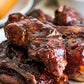 Plate of ribs glazed with J. Coleman's BBQ sauce
