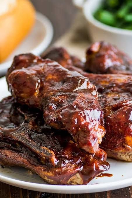 Plate of ribs glazed with J. Coleman's BBQ sauce